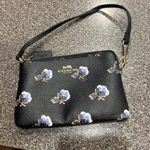 COACH Black Floral Wristlet with Blue and Tan Accents